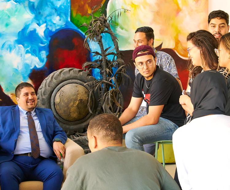 Candidates chatting with Samir Rachidi, Director of the IRESEN